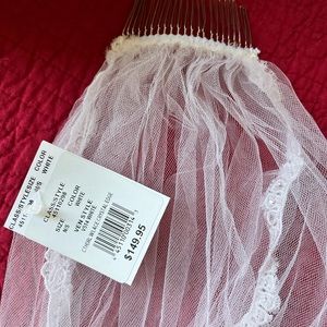 NWT David’s Bridal white cathedral wedding veil with sparkly lace. Never worn!